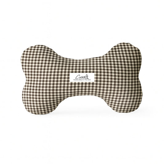 Bone-shaped pet squeaky toy with brown
gingham pattern on a white background
