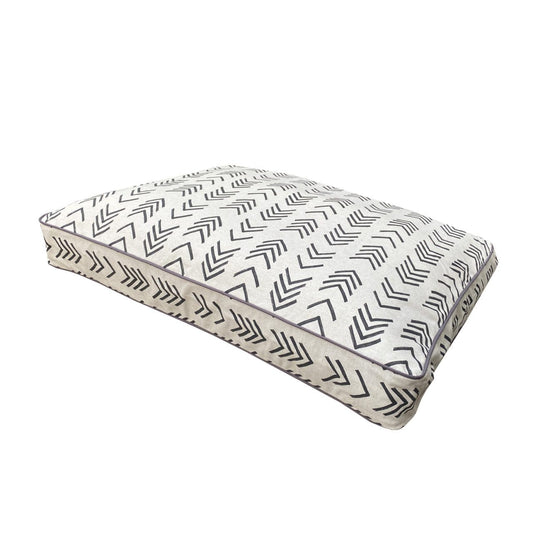 White and black mattress dog bed