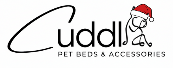 Cuddle brand logo for pet beds and accessories with a dog wearing a Santa hat.