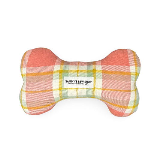 pastel colored check bone shaped squeaky tou