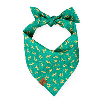 Green dog bandana with reindeer pattern 