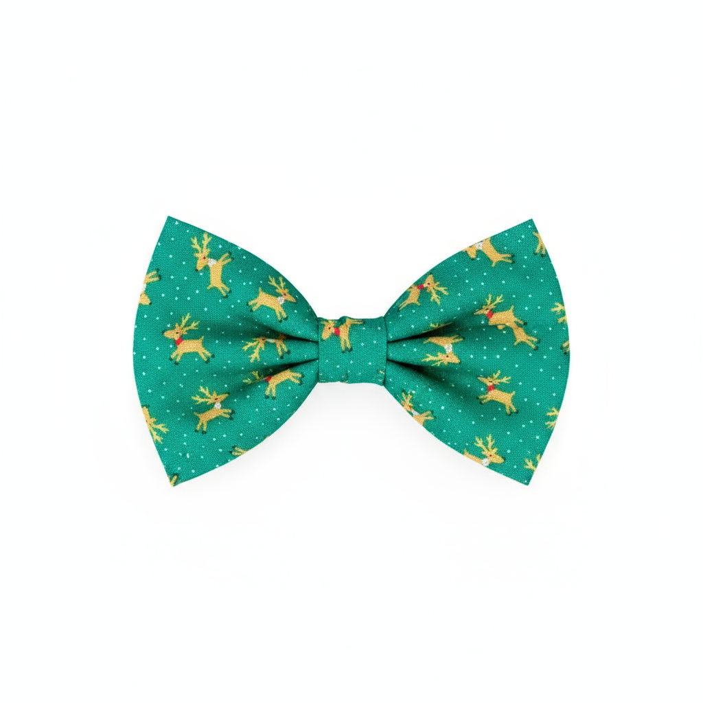 Green dog bow tie with reindeer pattern on a 