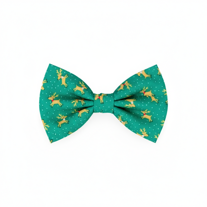 Green dog bow tie with reindeer pattern on a 